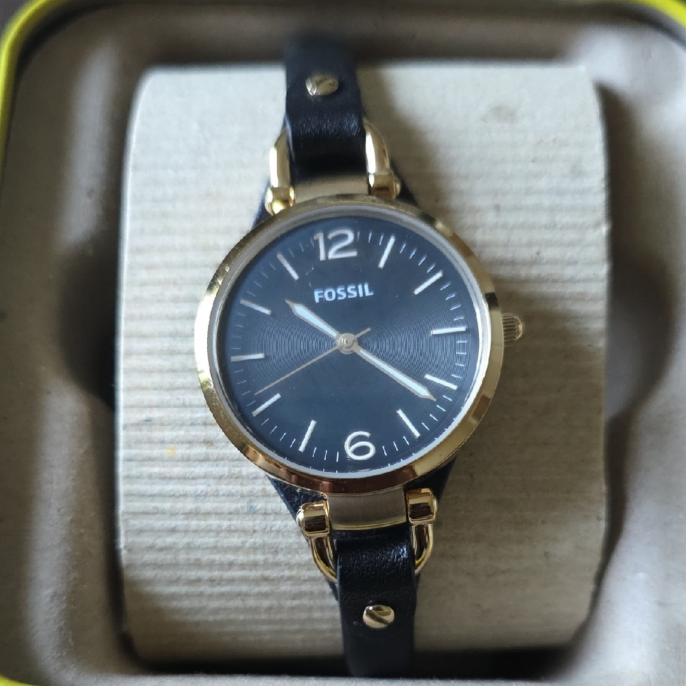 Fossil Women's Black and Gold Timepiece